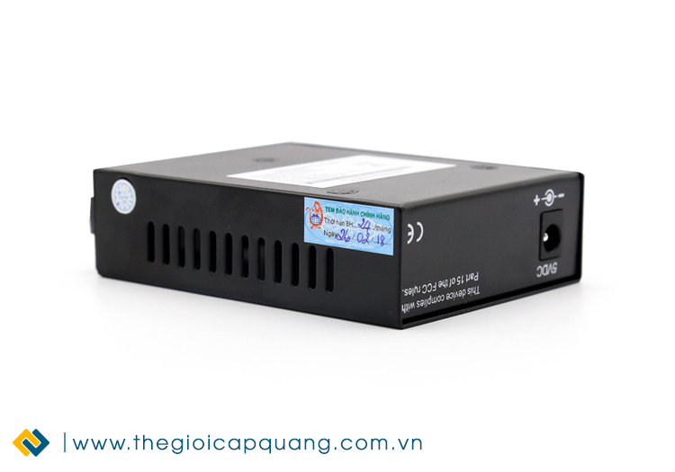 Tem bảo hành và mặt sau Converter 2 sợi quang 10/100